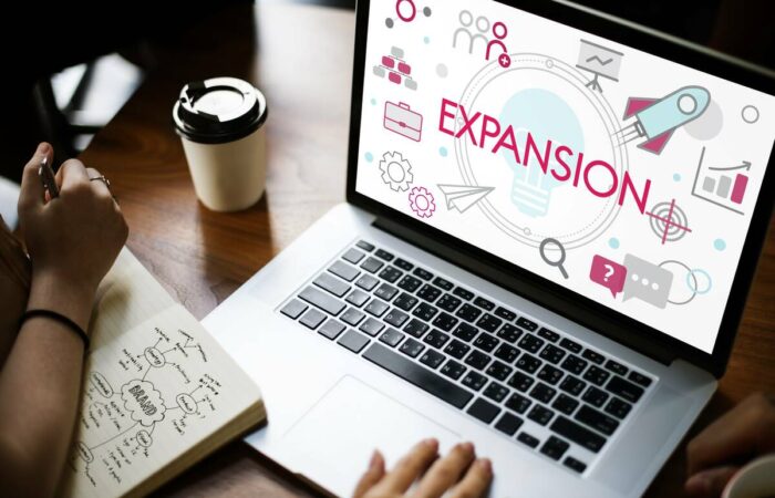 business-expansion-research-1200 business expansion funding research on laptop