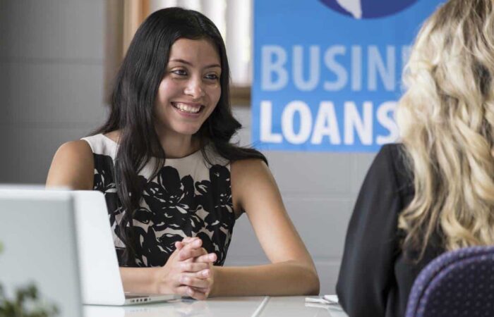 business-loan-account-manager-1200 person discussing business loan options