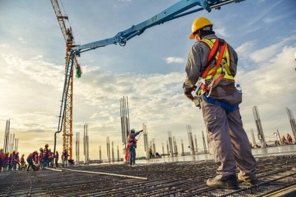 construction-workers-using-machinery-1200 construction-workers-using-machinery-1200