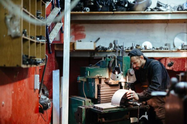 equipment-financing-for-startup-business-1200 man in workshop using drill
