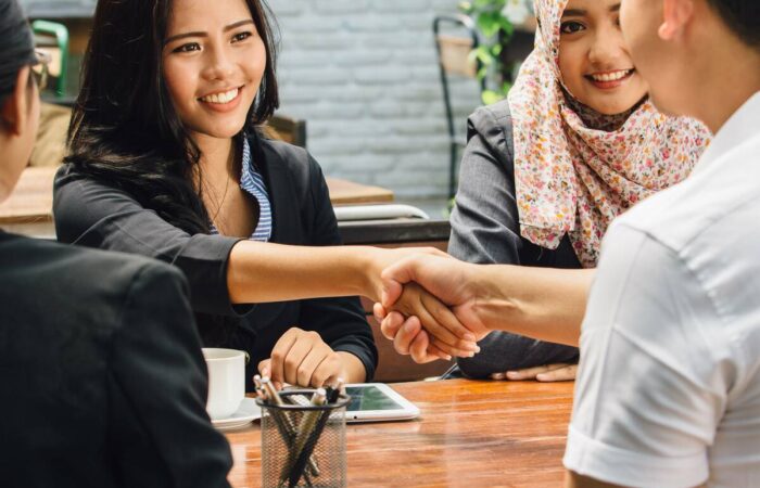 islamic-finance-1200 two people shaking hands after business deal