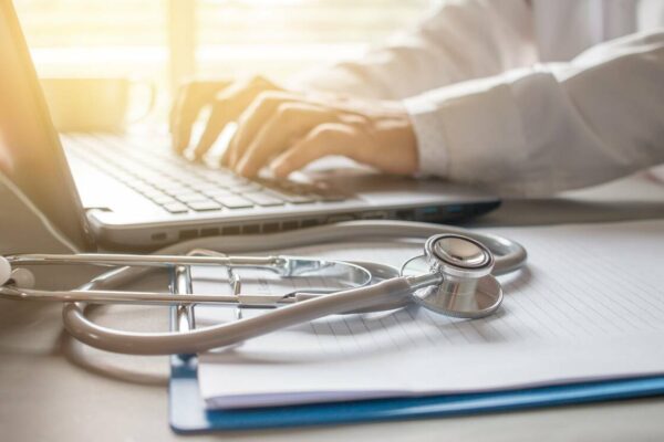 laptop-and-stethoscope-1200 business loans for medical practices