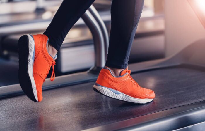 person-running-on-leased-treadmill-1200 person on treadmill
